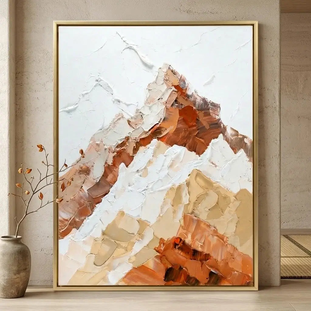 Abstract mountain art print in a modern office setting with a desk and chair.