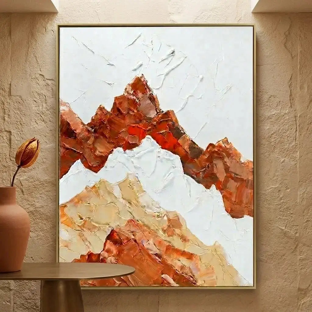 Abstract mountain painting in a modern dining room with wooden table and chairs.