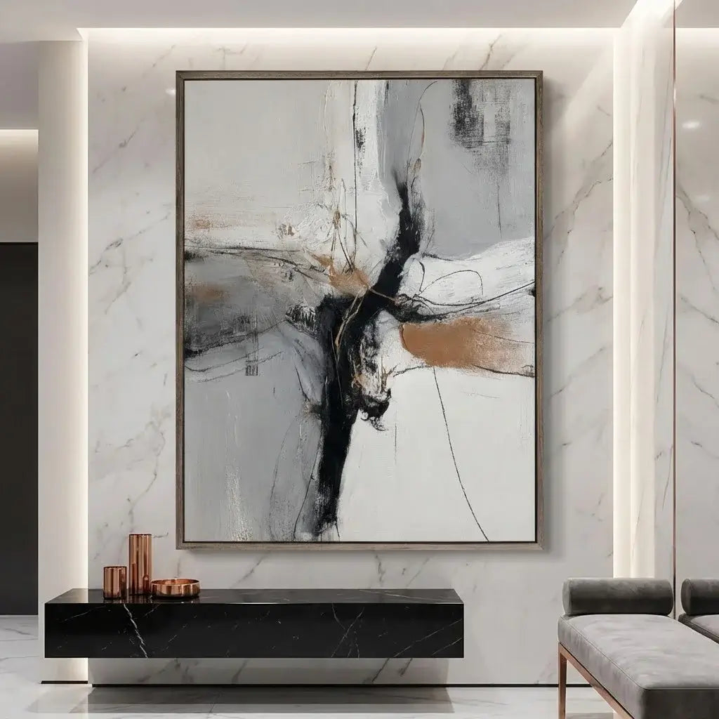 Abstract art piece on a marble wall in a modern interior setting