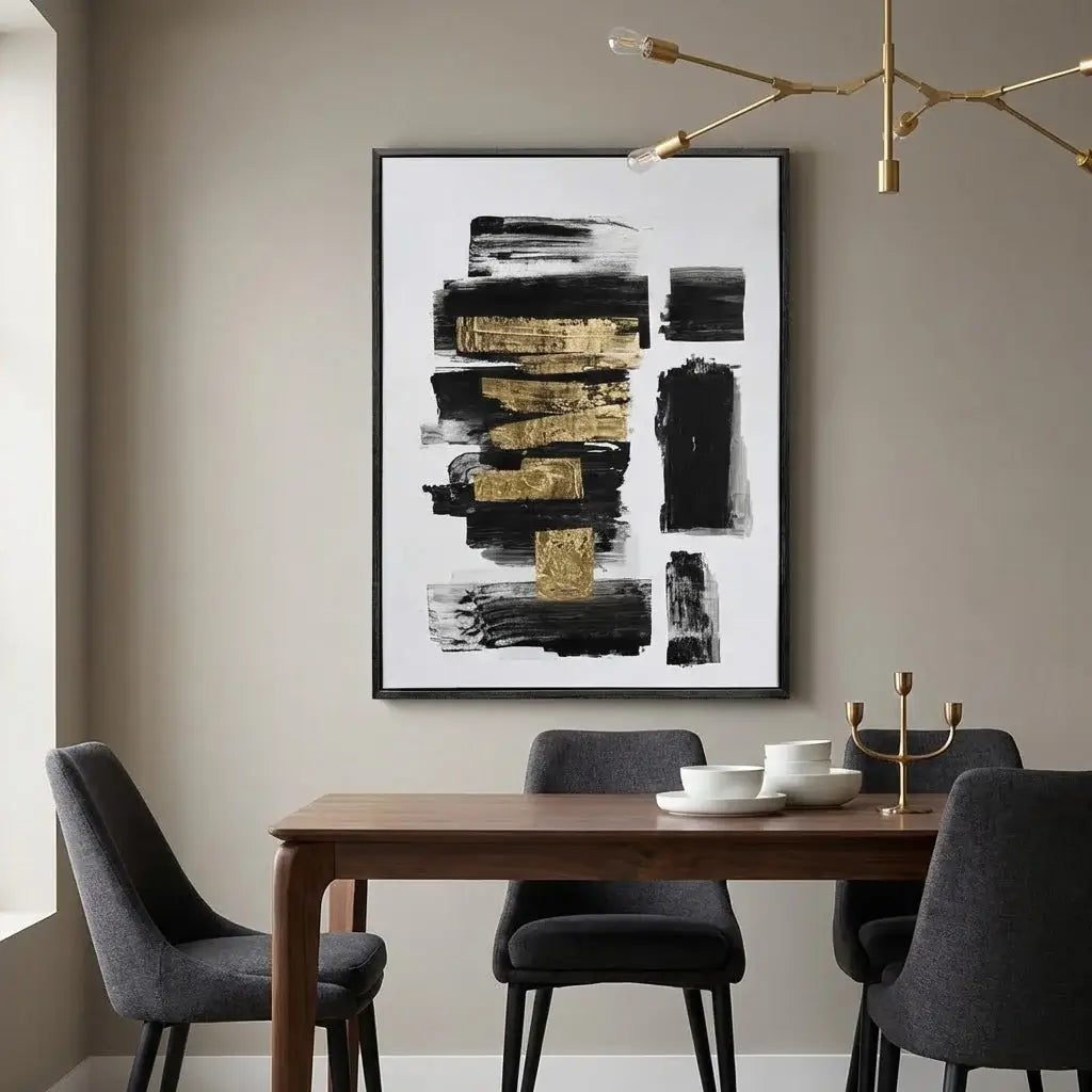 Dining room with a wooden table and gray chairs, abstract art on the wall.
