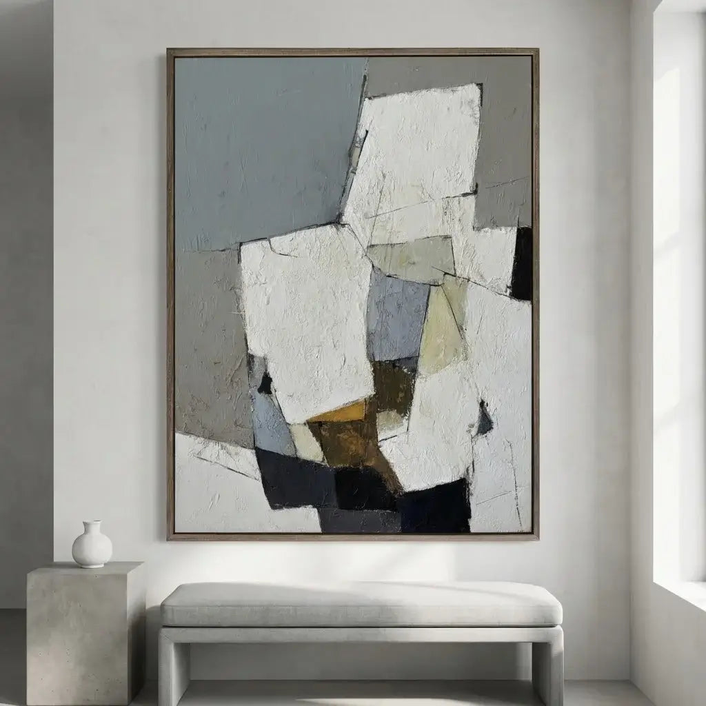 Abstract art piece on a wall in a modern interior setting