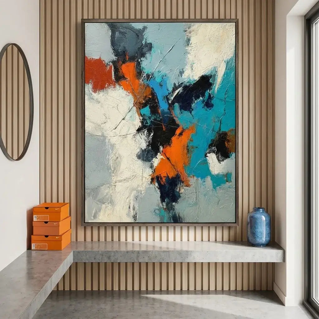 Abstract painting in a modern interior setting with a shelf and decorative items.