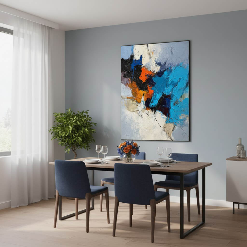 Dining room with a wooden table, blue chairs, and a colorful abstract painting on the wall.
