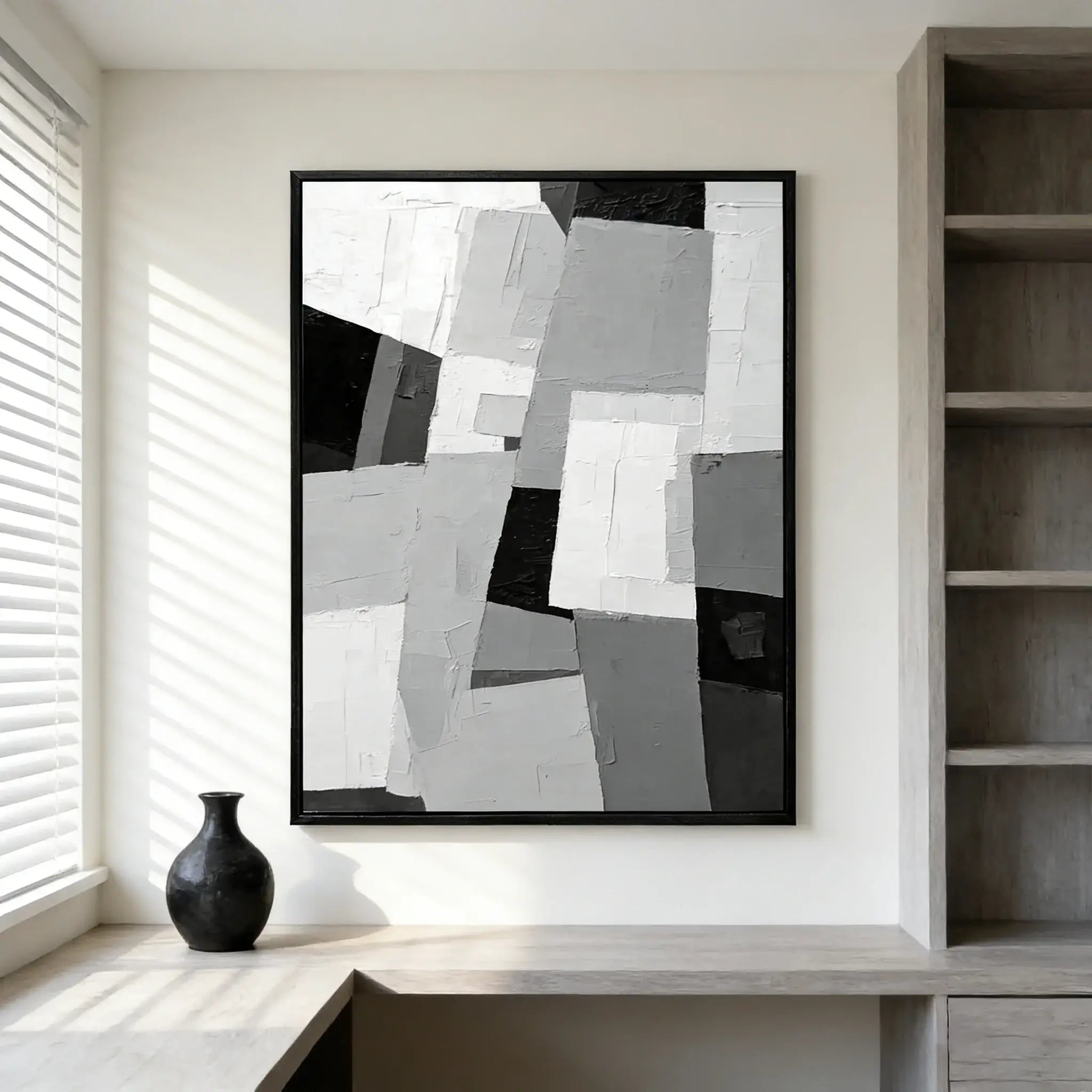Abstract art piece in a modern interior setting with a vase and shelves.