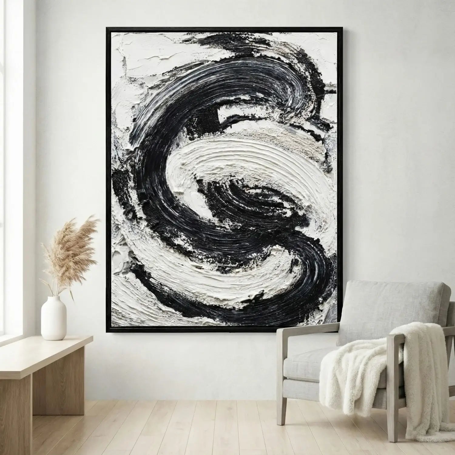 Abstract black and white painting in a modern living room.