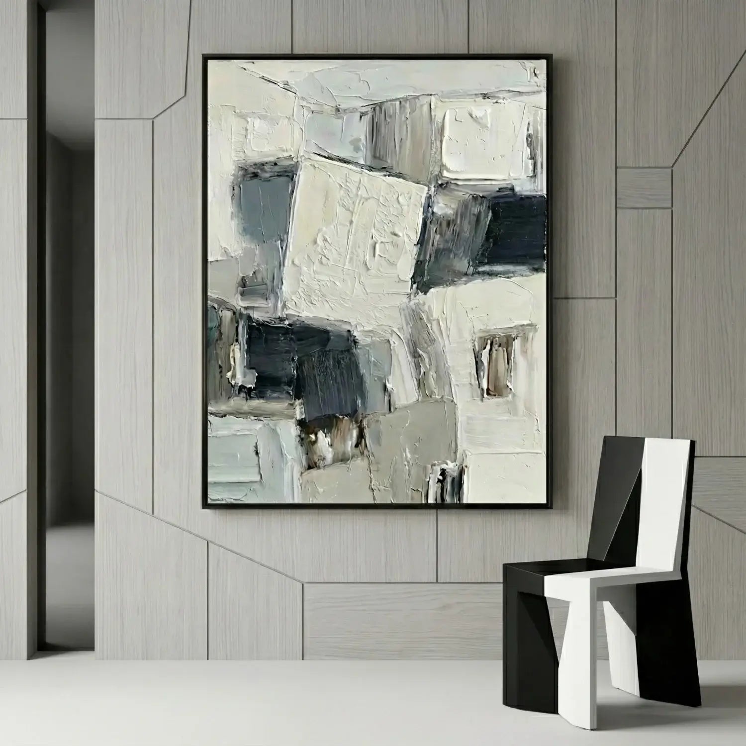 Abstract painting in a modern interior setting with a chair.