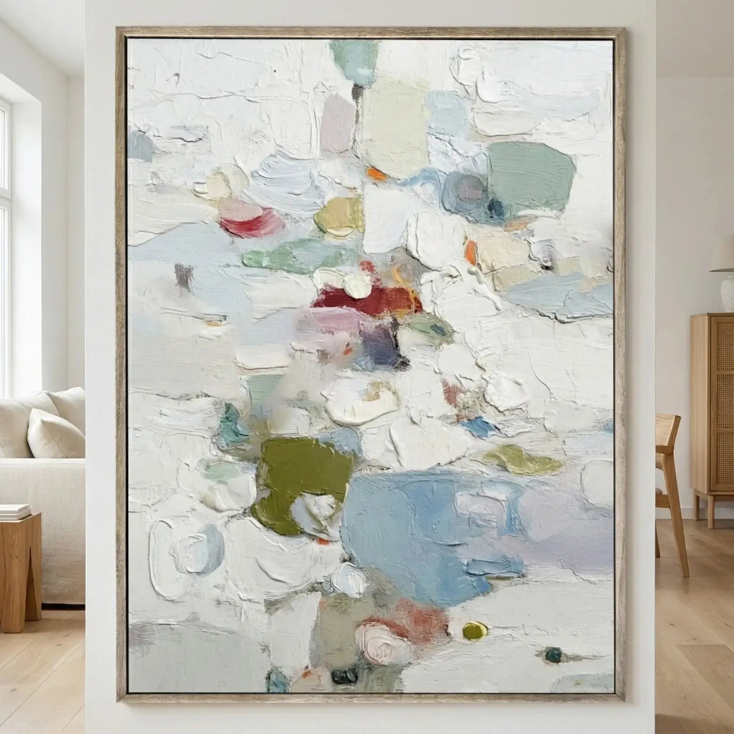 Abstract painting with multicolors in a modern living room setting