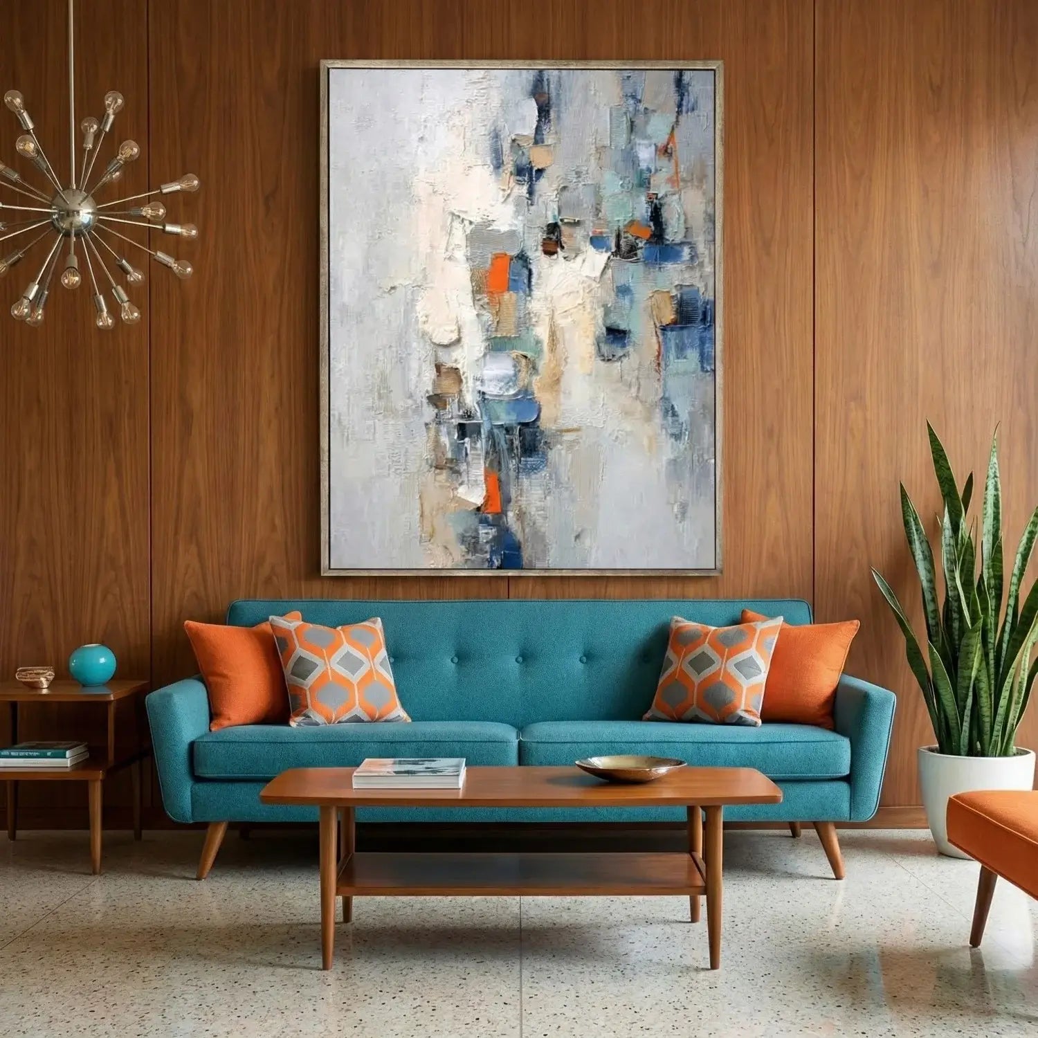 Modern living room with teal sofa, abstract painting, and decorative items.