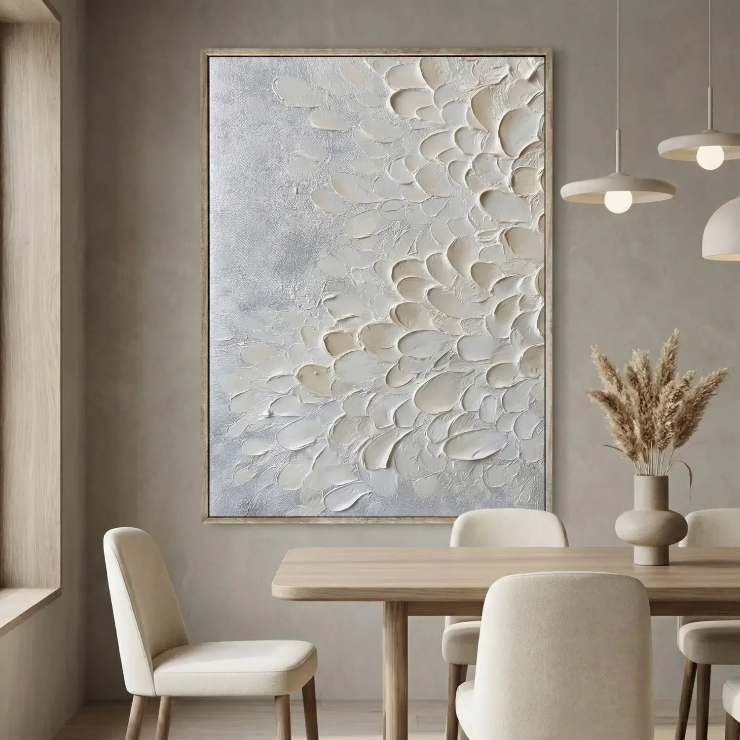 Dining room with abstract art on the wall, table, and chairs.