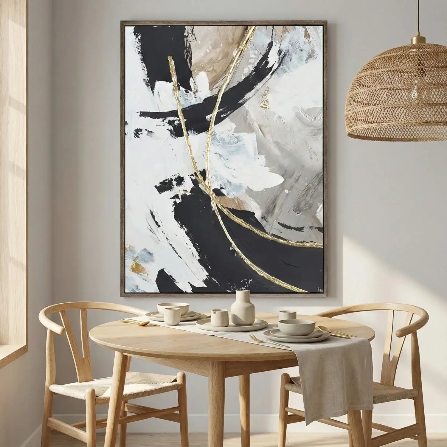 Dining room with a round wooden table, chairs, and abstract art on the wall.