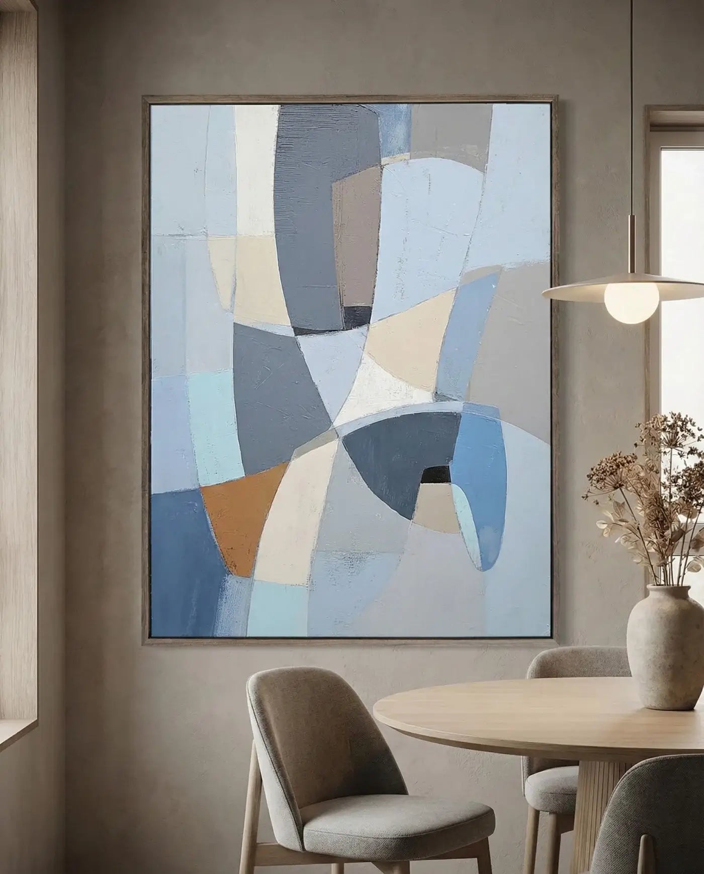 Abstract art piece in a modern interior setting with a dining table and chairs.