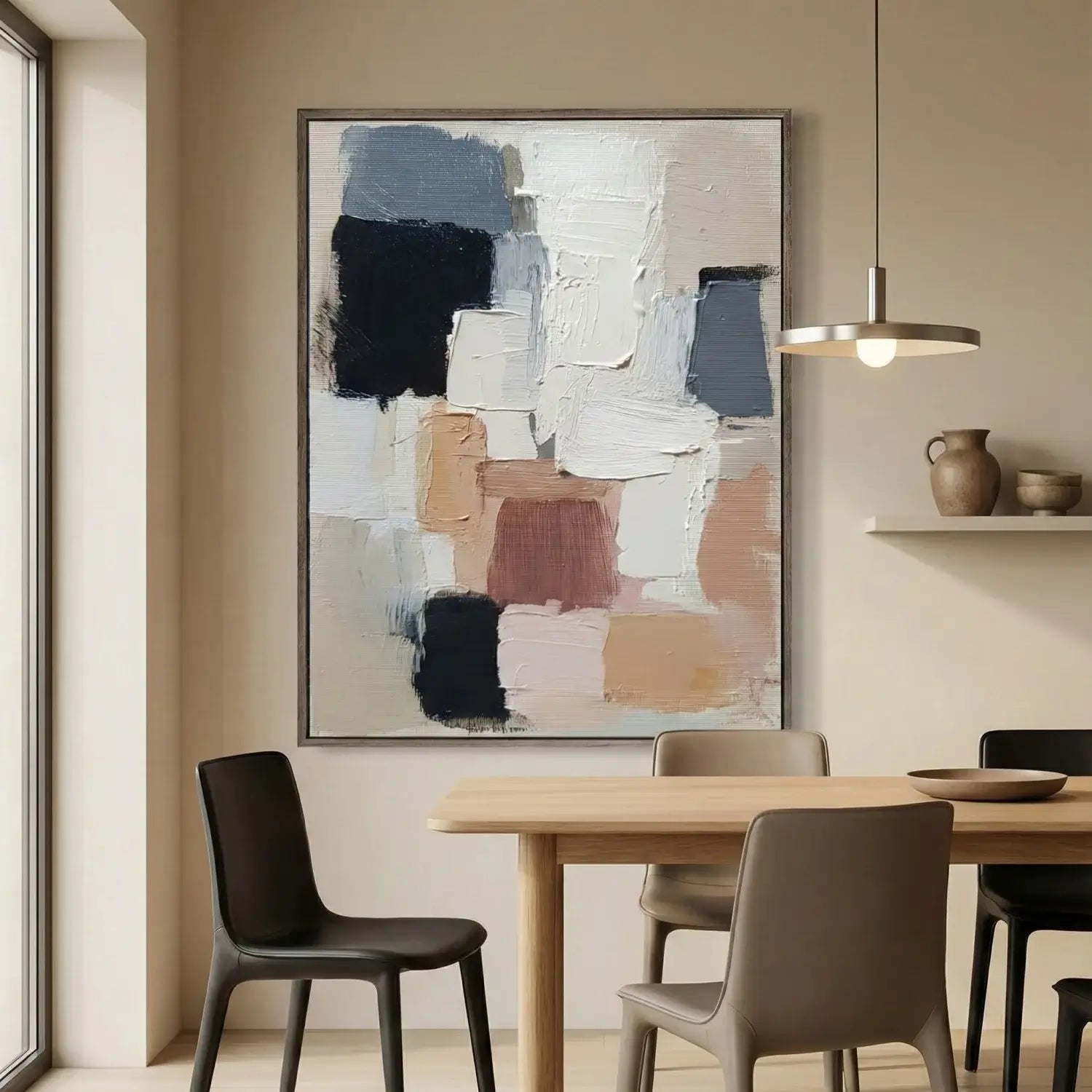 Dining room with abstract art on the wall, wooden table, and chairs.