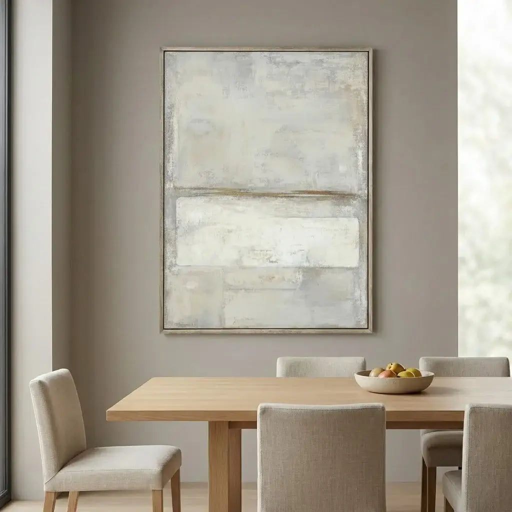Dining room with a wooden table and chairs, abstract painting on the wall.