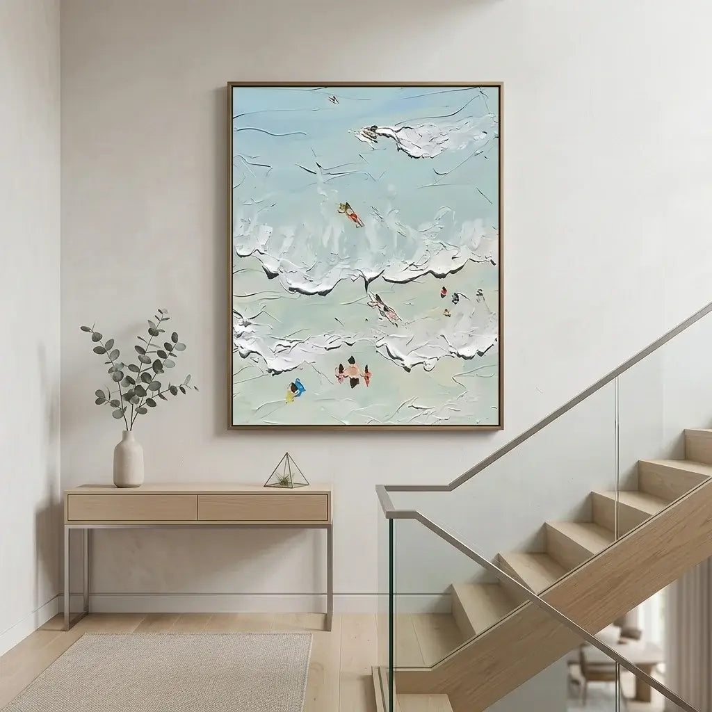 Modern interior with a painting on the wall above a console table and staircase.