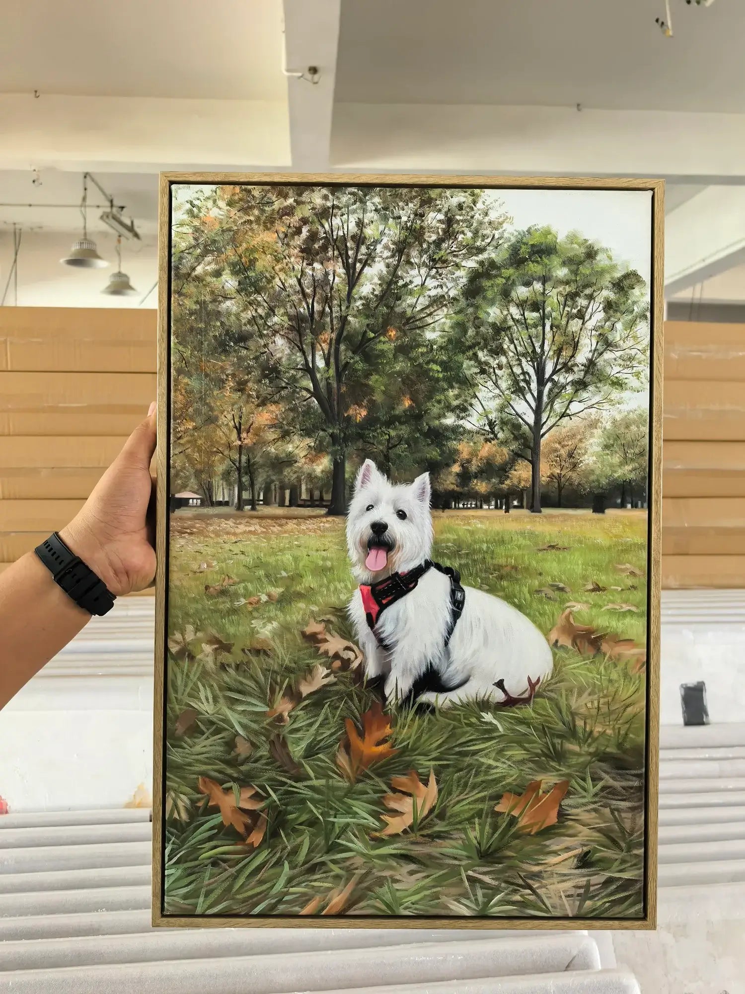 Framed artwork of a white dog sitting in a park with trees and grass.