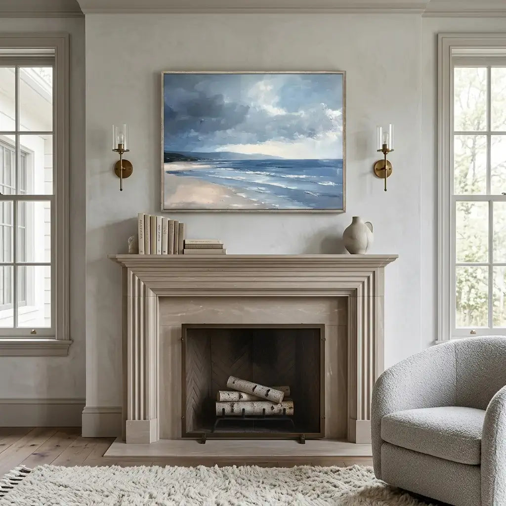 Living room with a fireplace, artwork above it, and a chair.