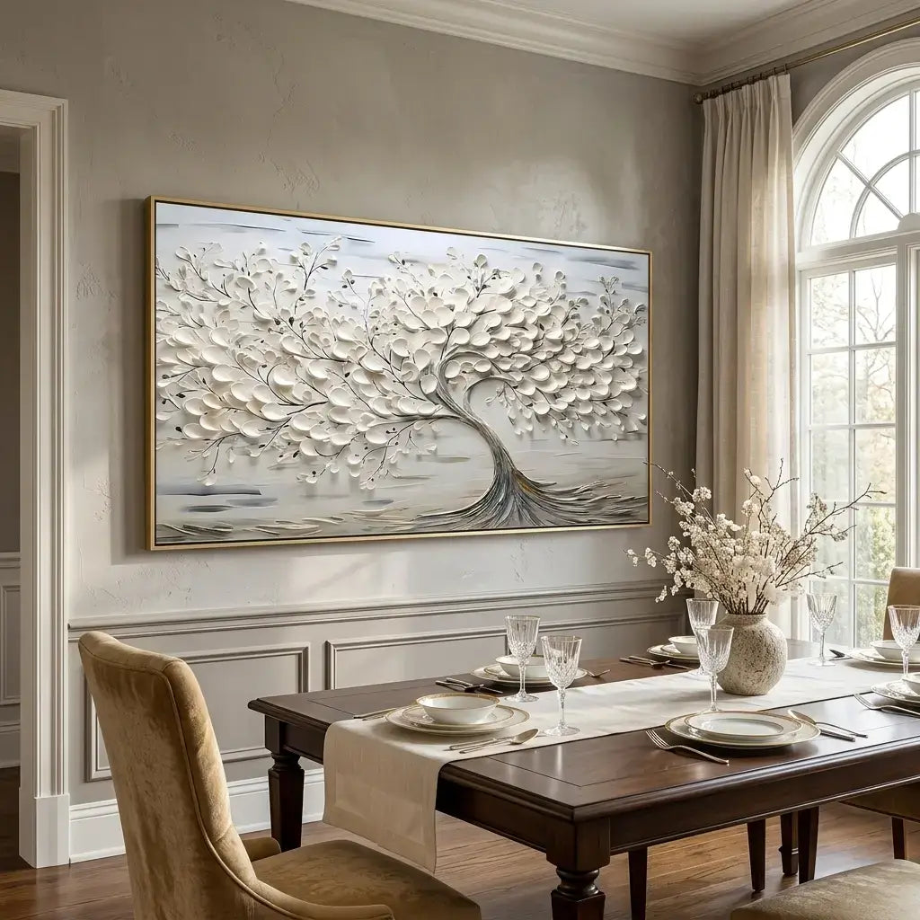 Dining room with a large abstract painting on the wall and a set table.