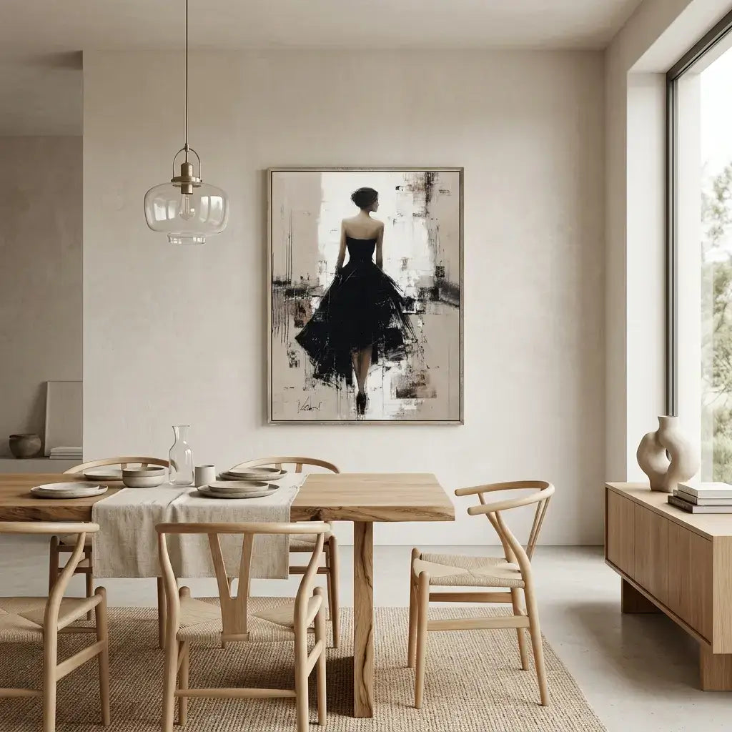 Modern dining room with wooden table and gray chairs, featuring a large mirror on the wall.