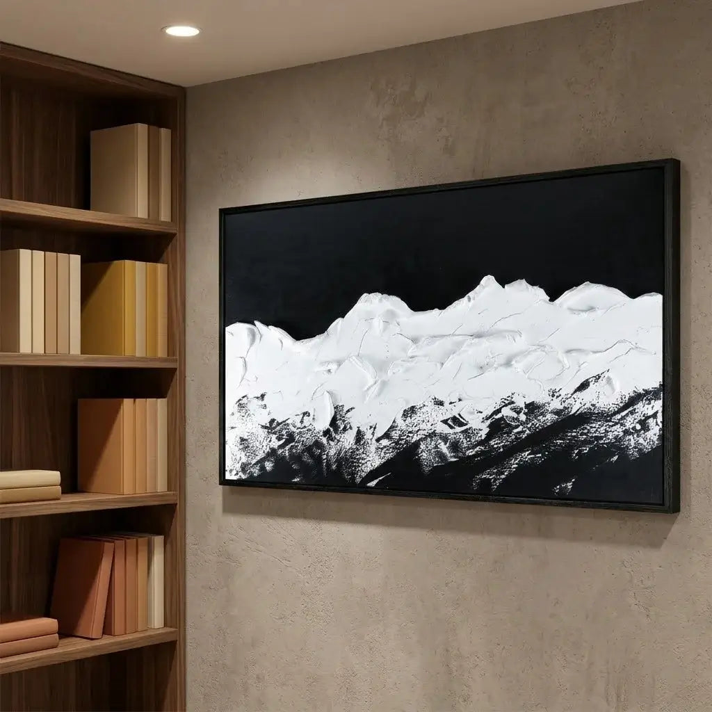 Modern living room with WALL ART, a wooden sideboard with books and a vase.