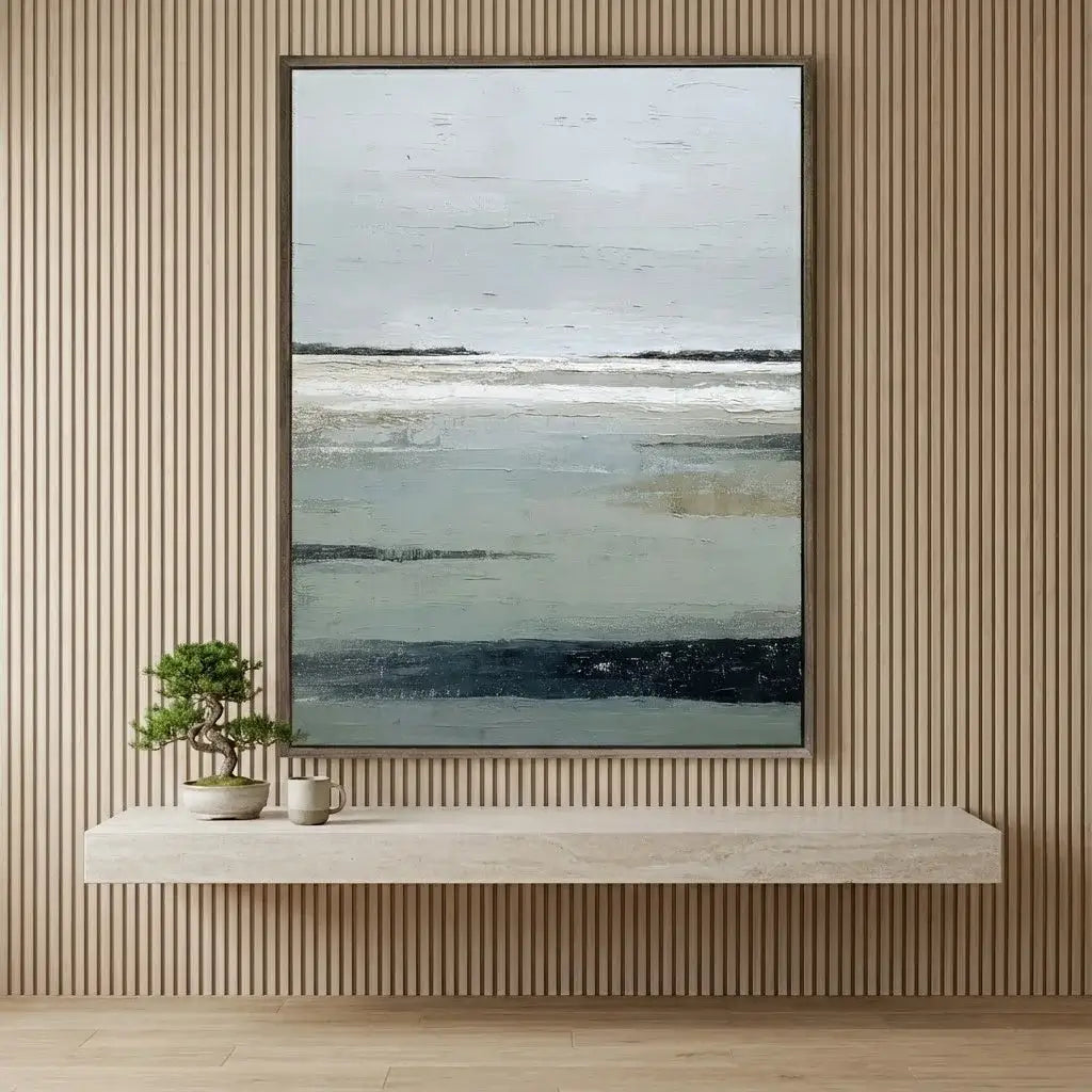 Abstract painting on a wall above a wooden shelf with a plant