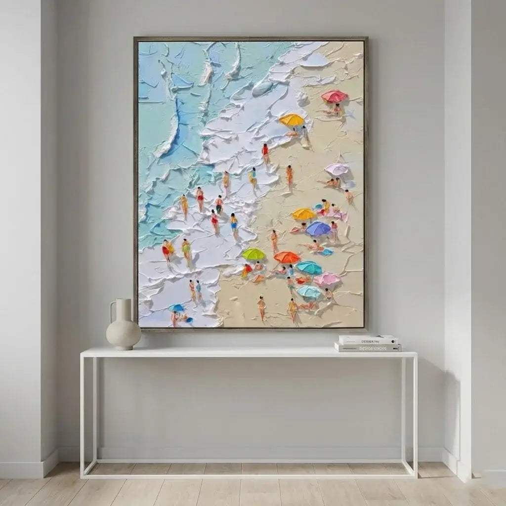 Colorful beach scene painting on a wall above a white console table.