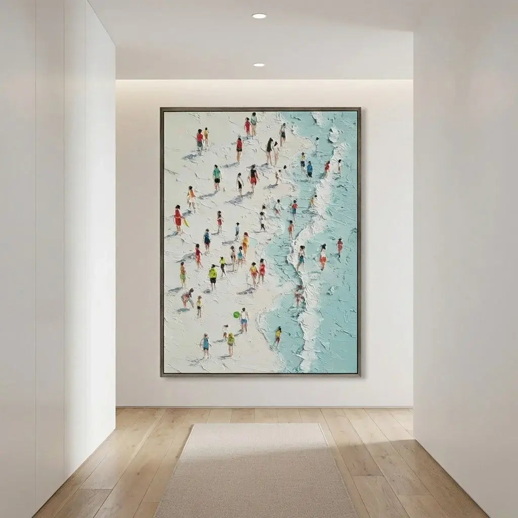 Framed artwork of people on a beach in a modern interior setting