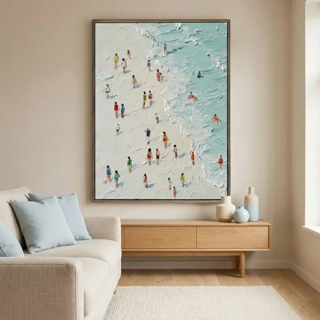 Living room with a beach scene painting above a wooden console table.