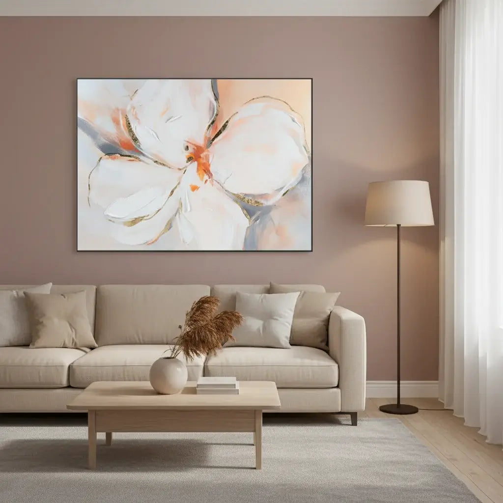 Living room with a beige sofa, coffee table, and abstract floral painting on the wall.