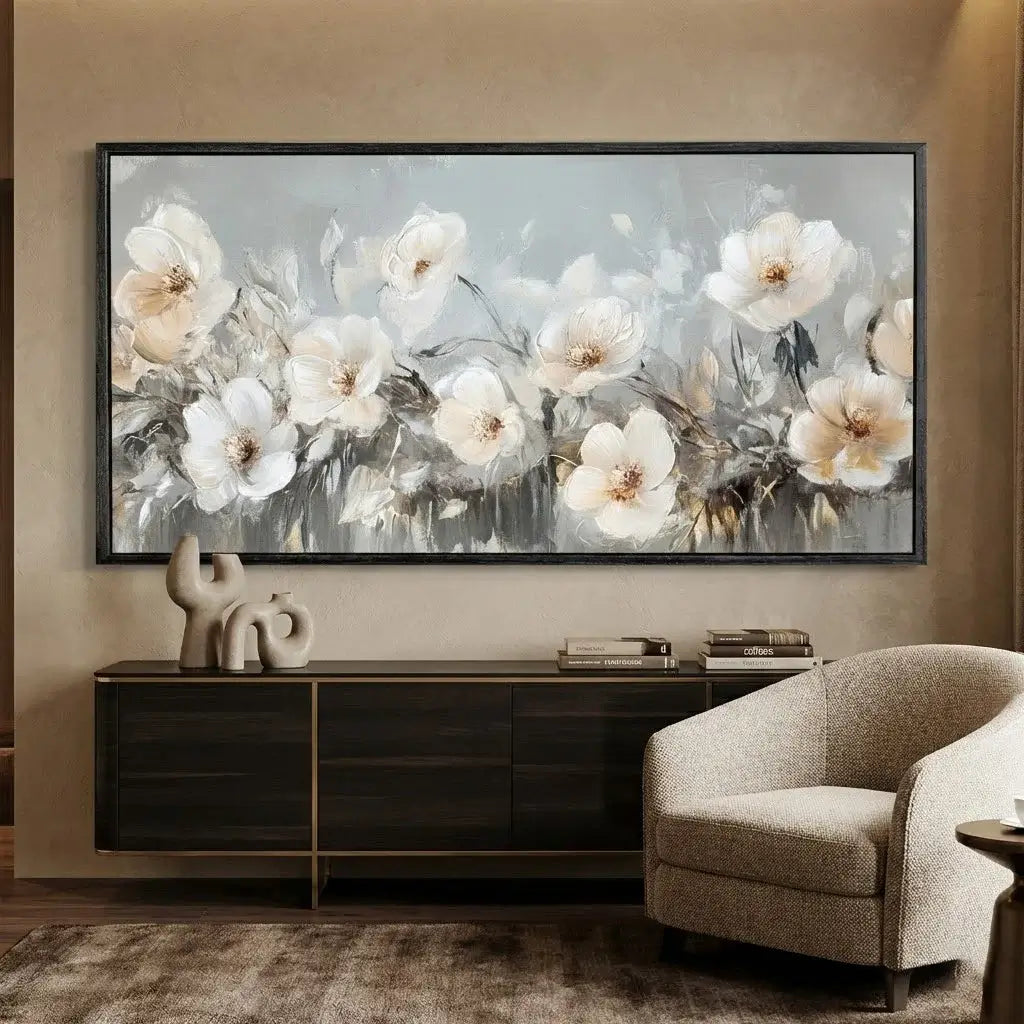 Floral painting on a wall above a dark wooden cabinet in a living room.