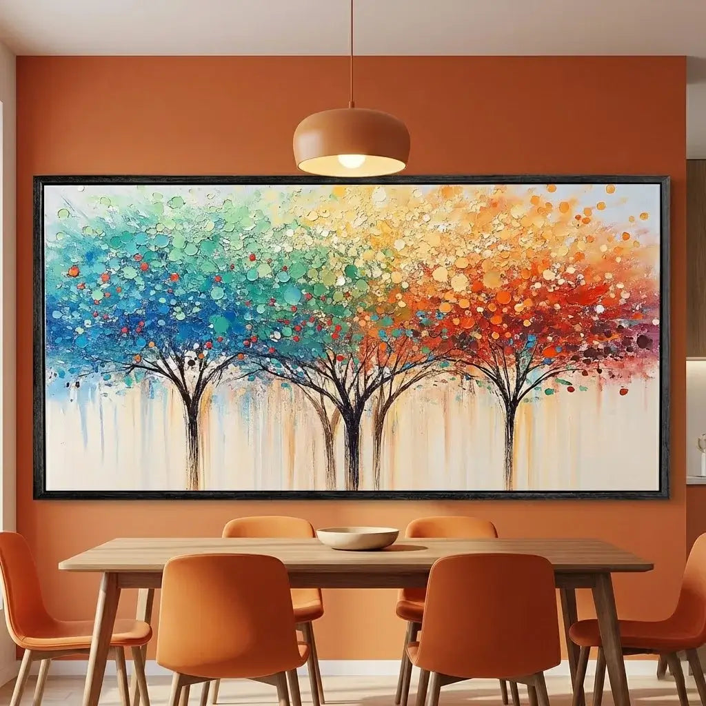 Dining room with a colorful abstract painting of trees on an orange wall.