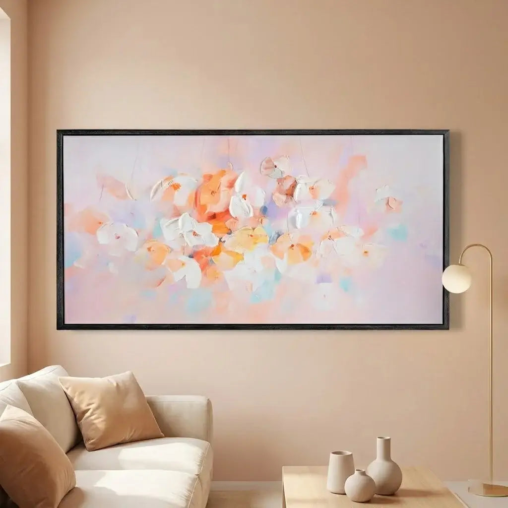 Colorful abstract painting on a wall above a sofa in a living room.