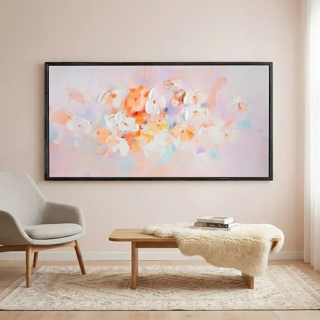 Living room with a large abstract painting on the wall, a chair, and a coffee table.