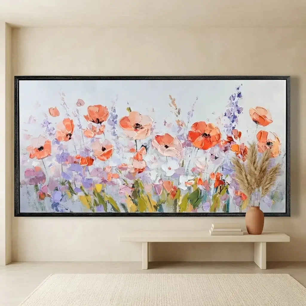 Floral painting on a wall with a vase on a shelf below.