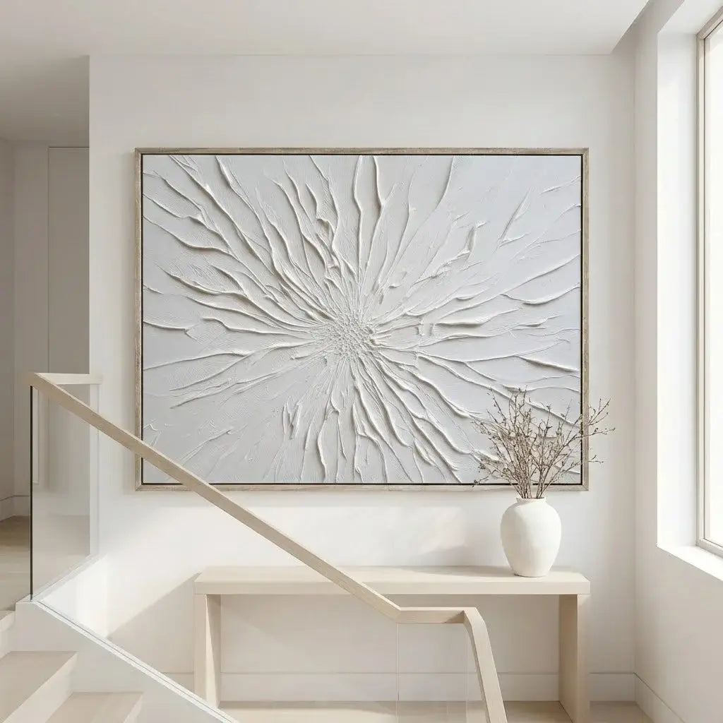 Abstract wall art in a modern interior setting with a vase on a table.