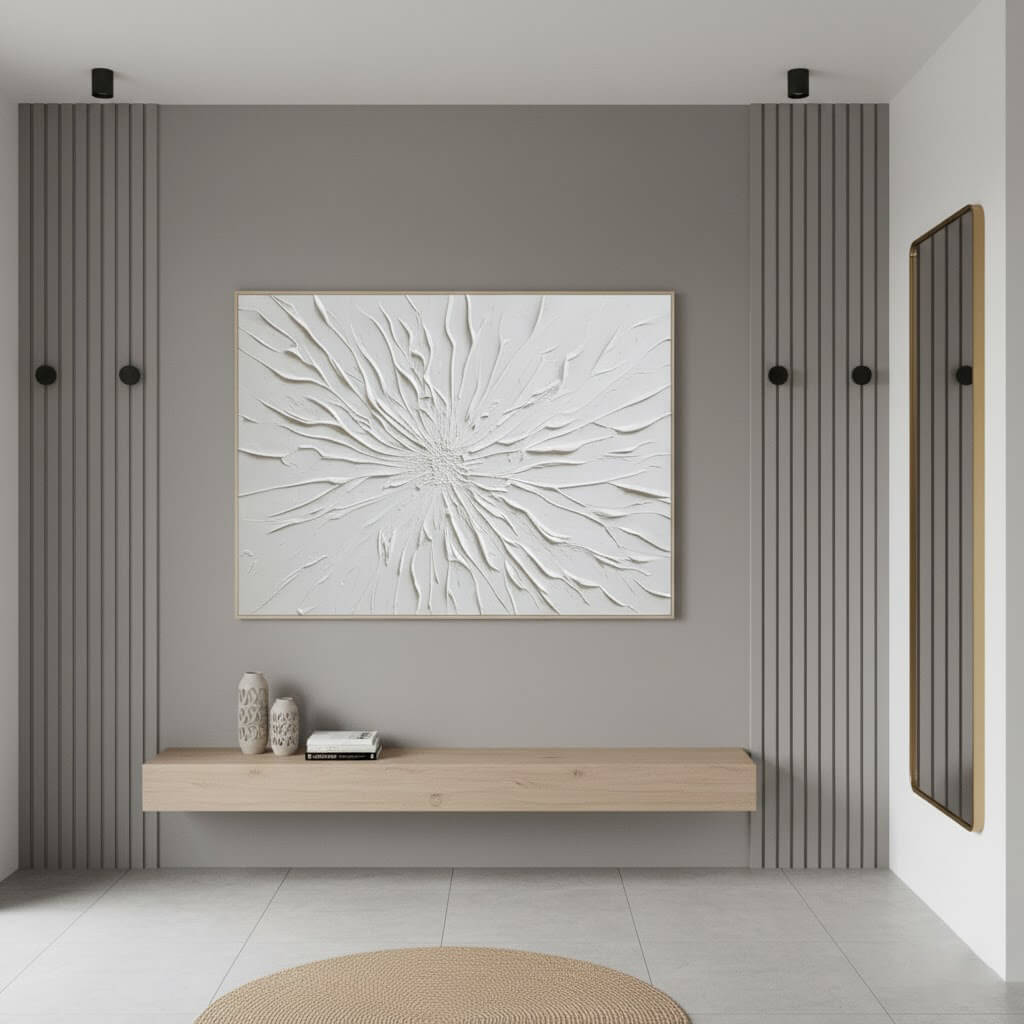 Modern interior with a textured wall art piece and wooden console table.