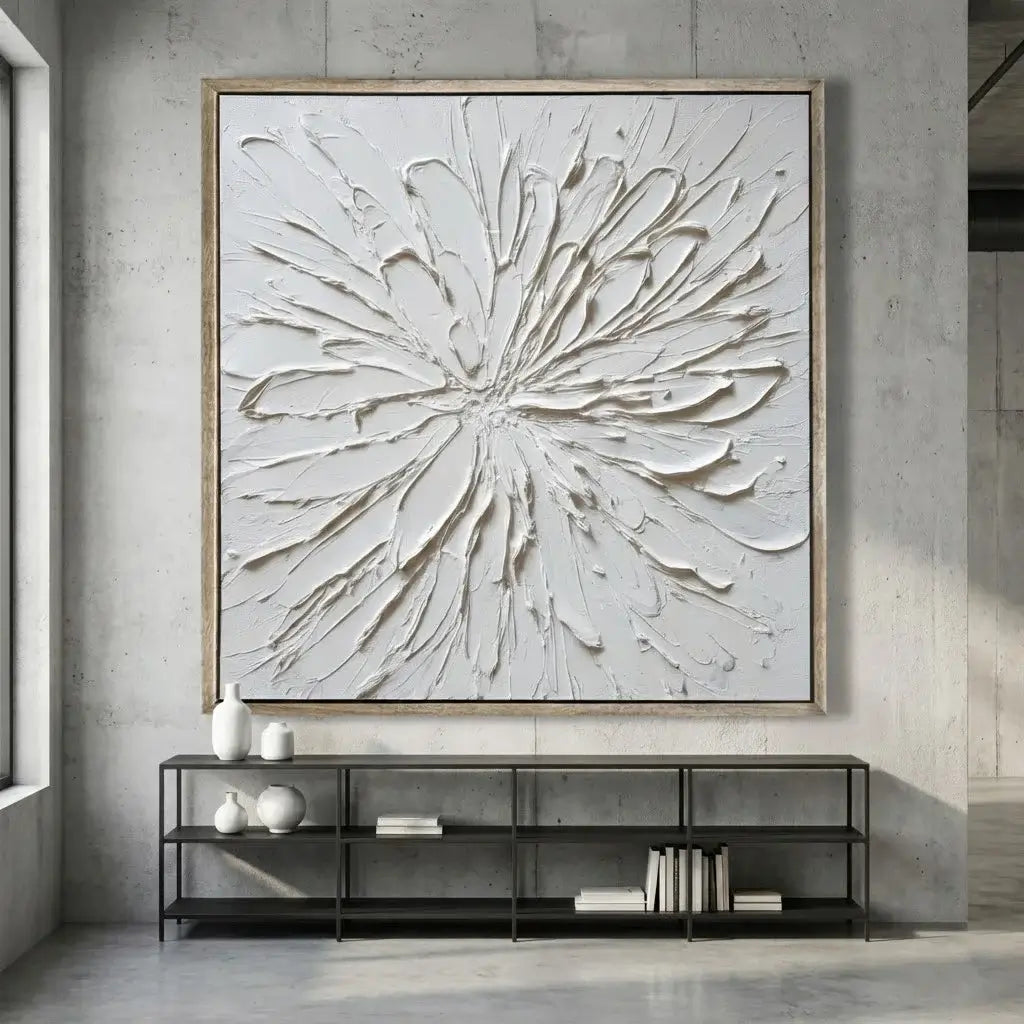 Abstract wall art in a modern interior setting with a black console table.