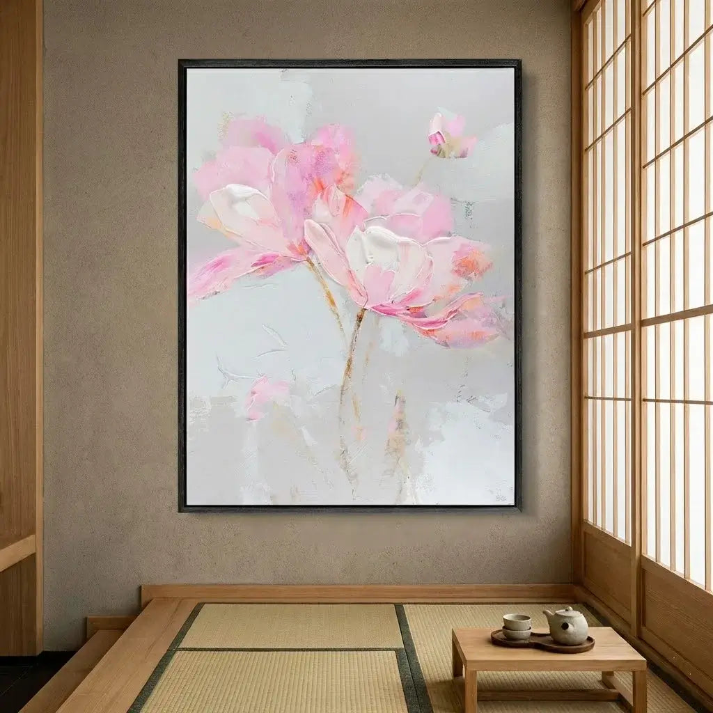 Framed abstract floral artwork on a wall in a room with wooden flooring and sliding doors.
