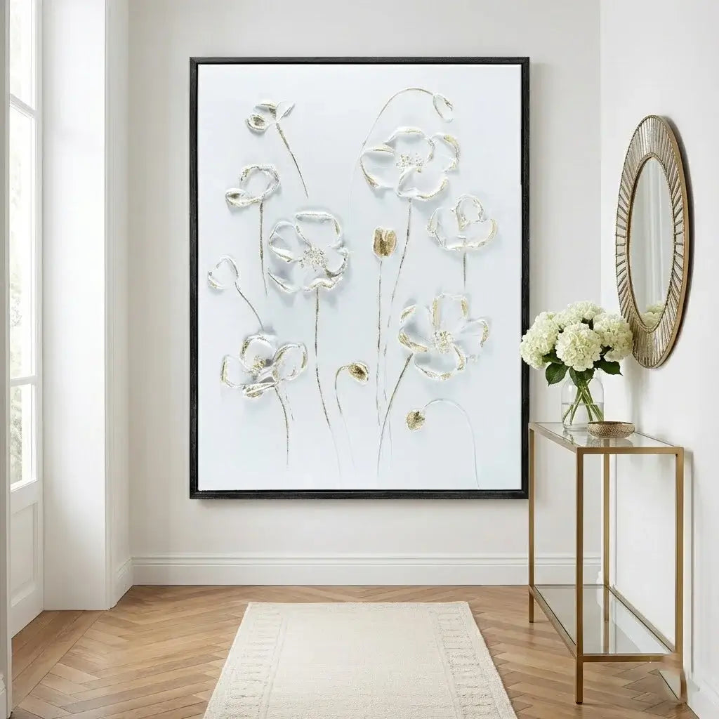Decorative floral wall art in a modern interior setting with a side table and mirror.
