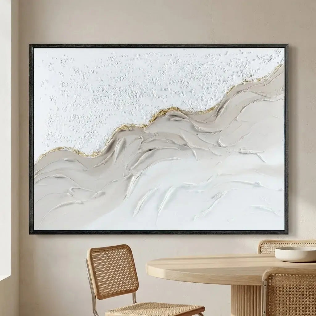 Abstract wall art in a modern interior setting with a table and chair.