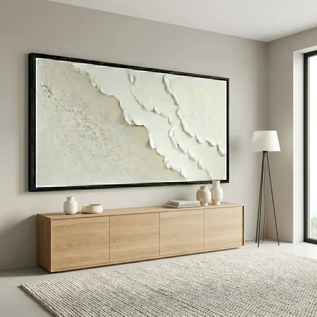 Modern living room with a large abstract painting on the wall above a wooden sideboard.