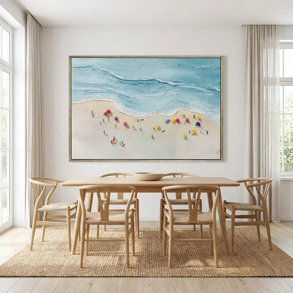 Dining room with wooden table and chairs, featuring a beach scene painting on the wall.