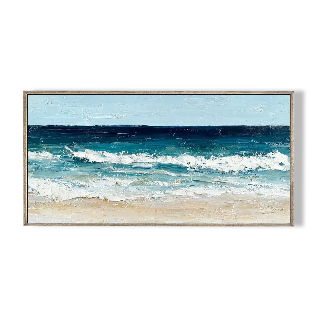 Framed artwork of a beach scene with blue ocean and white waves.