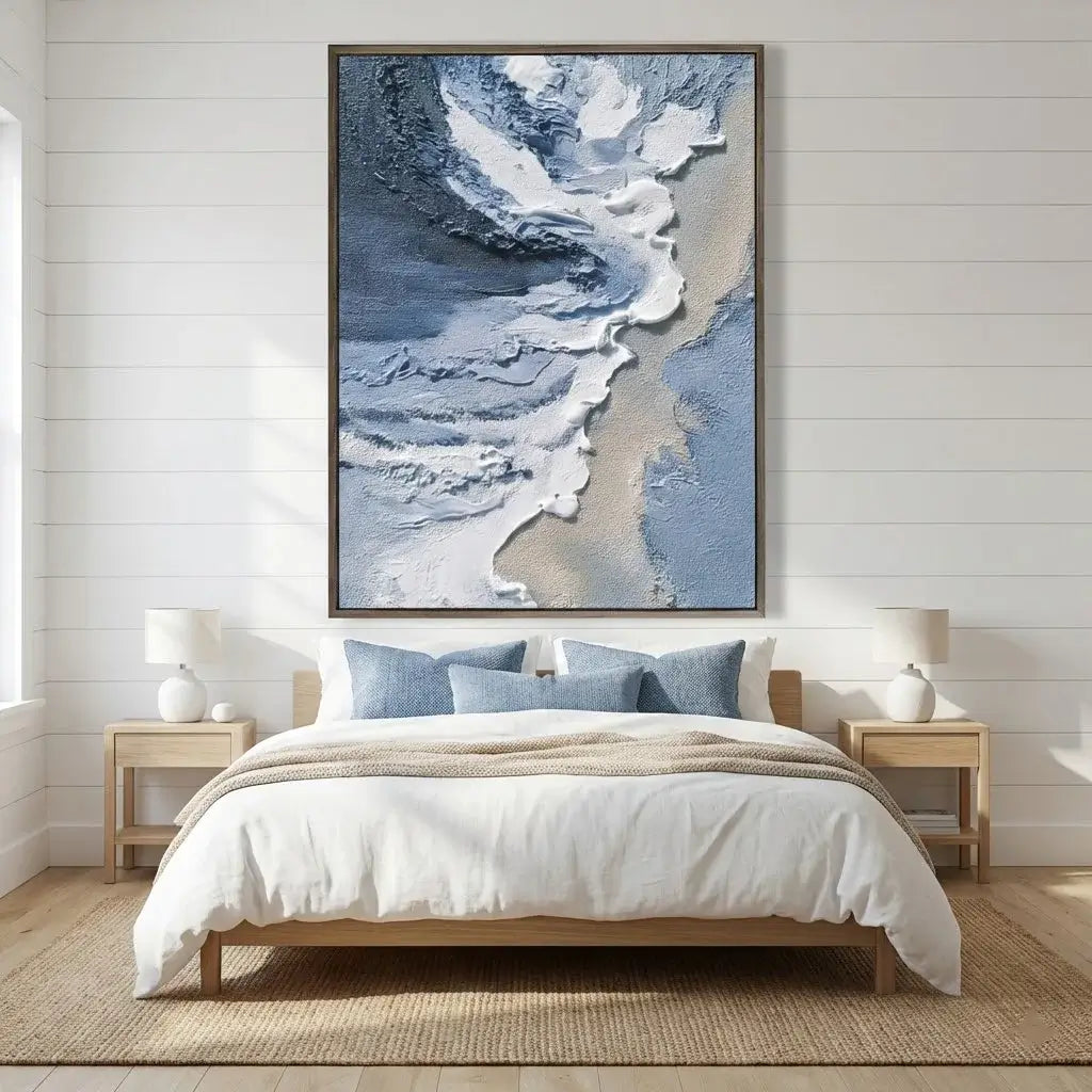 Bedroom with abstract blue artwork on the wall