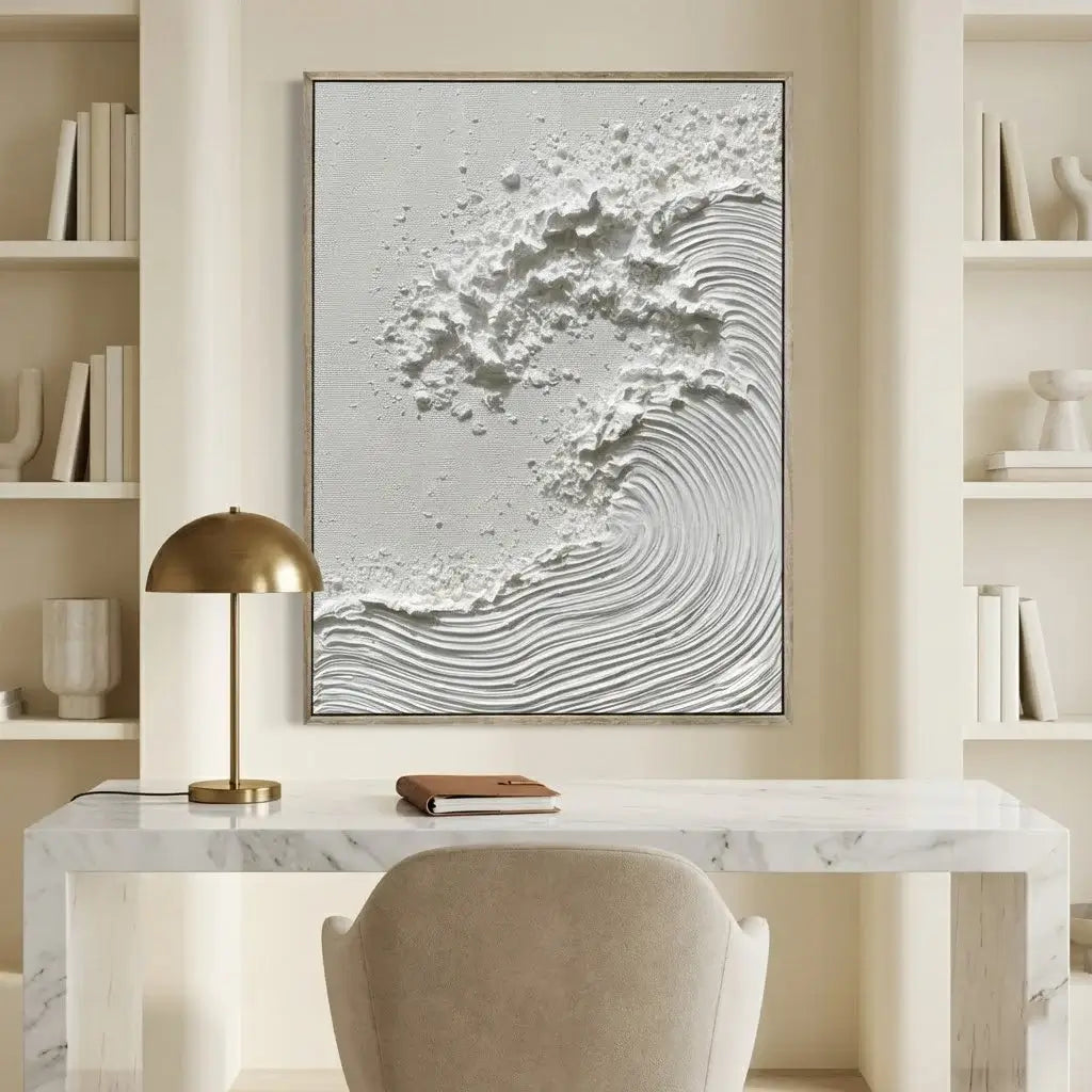 Modern interior with a marble desk, abstract wall art, and a gold lamp.