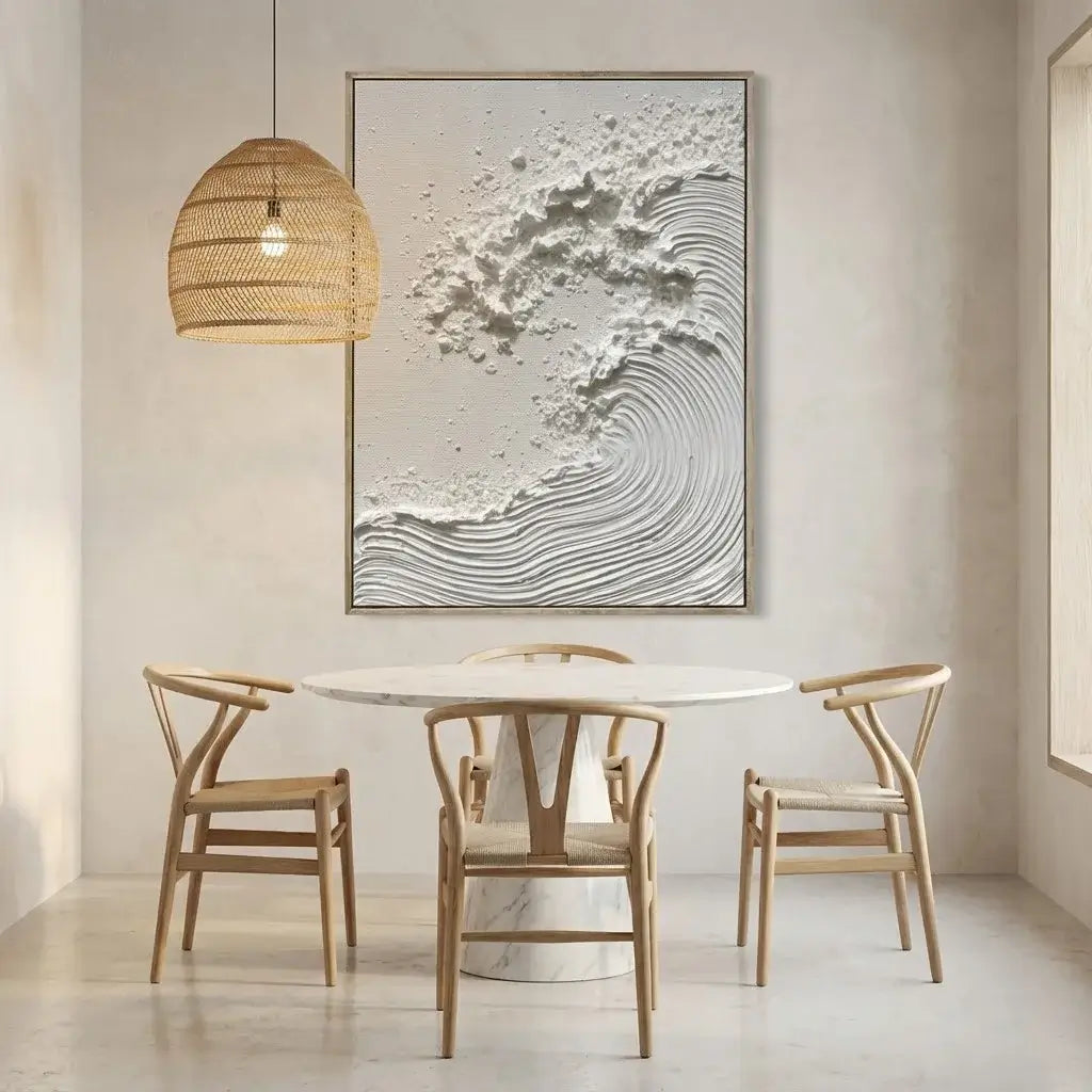 Dining area with marble table and wooden chairs, featuring a large abstract painting on the wall.