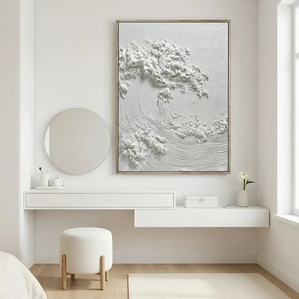 Modern bedroom with a white dresser, round mirror, and abstract wall art.