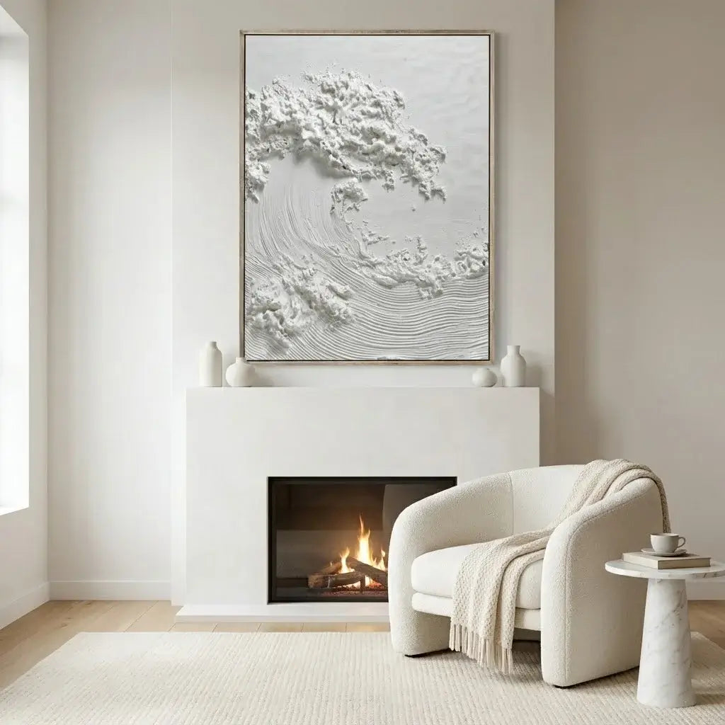 Modern living room with a fireplace, white armchair, and abstract artwork.