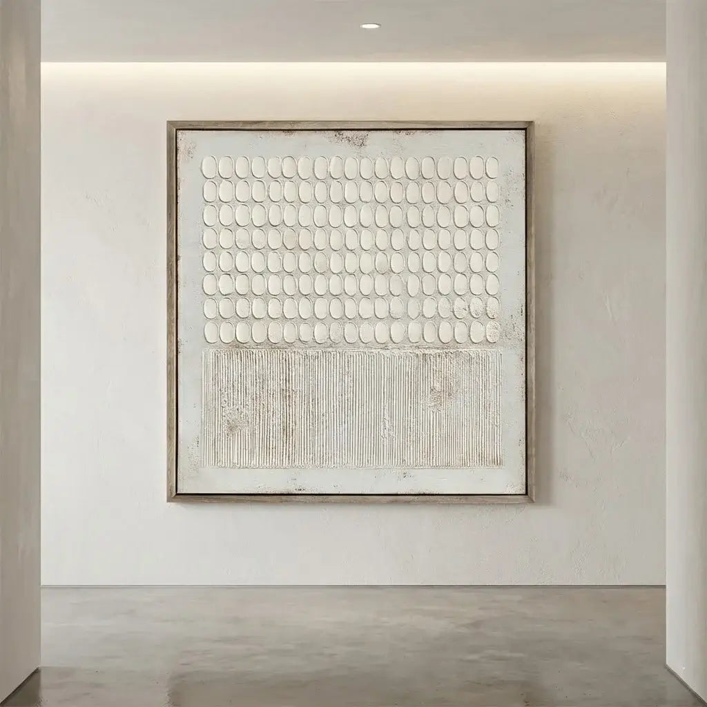 Abstract art piece on a wall in a modern interior setting