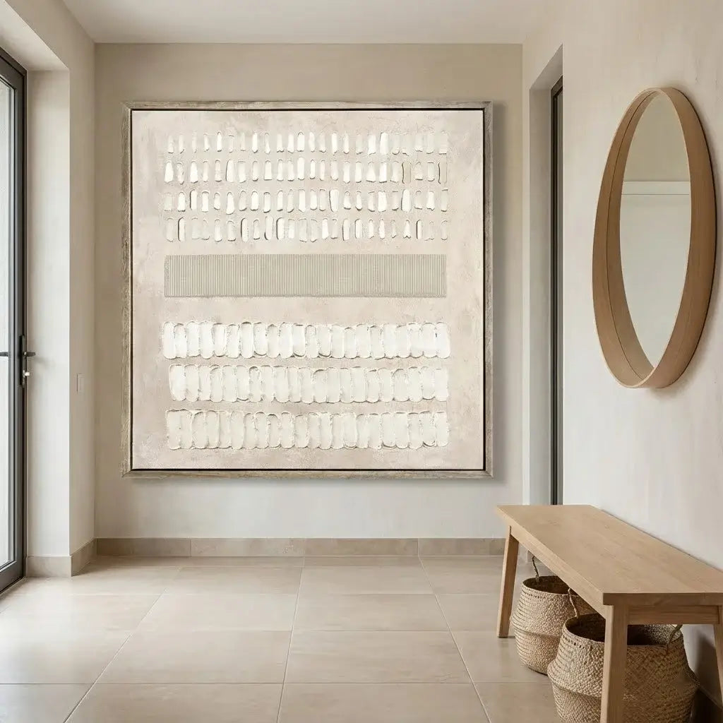 Modern interior with a large abstract painting, wooden bench, and round mirror.