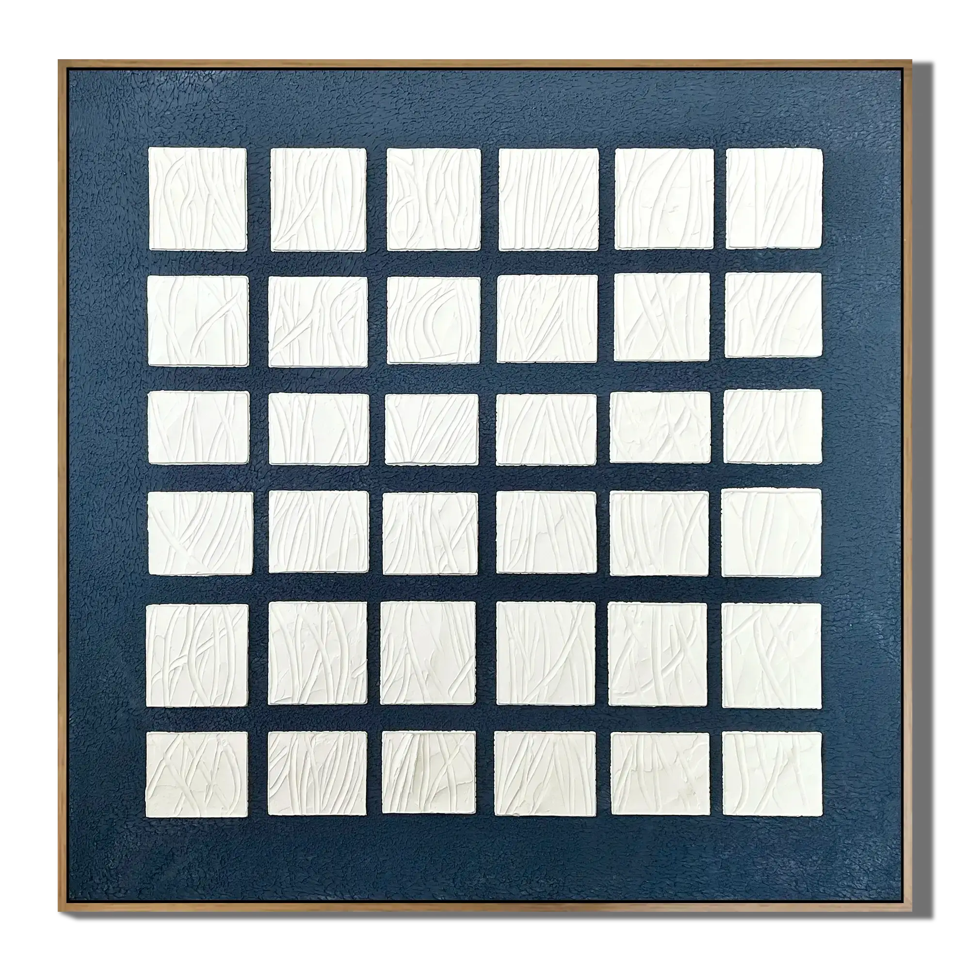Framed artwork with a grid of white squares on a blue background
